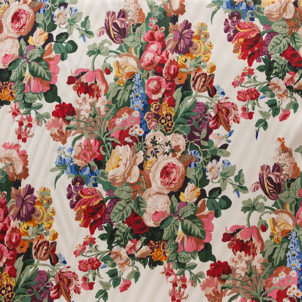 Close-up of a vibrant floral pattern block printed on fabric