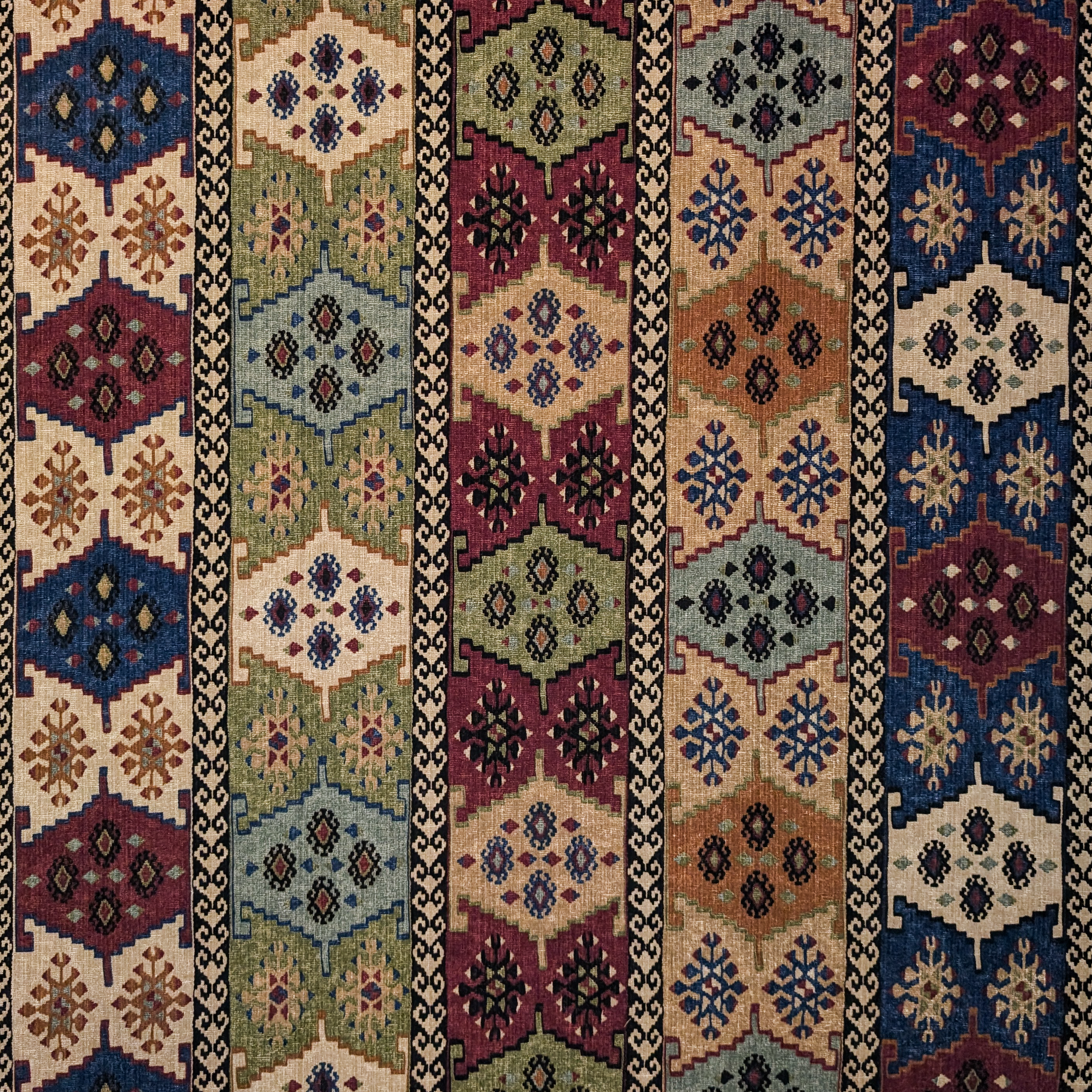 Patterned carpet with geometric design in various colors