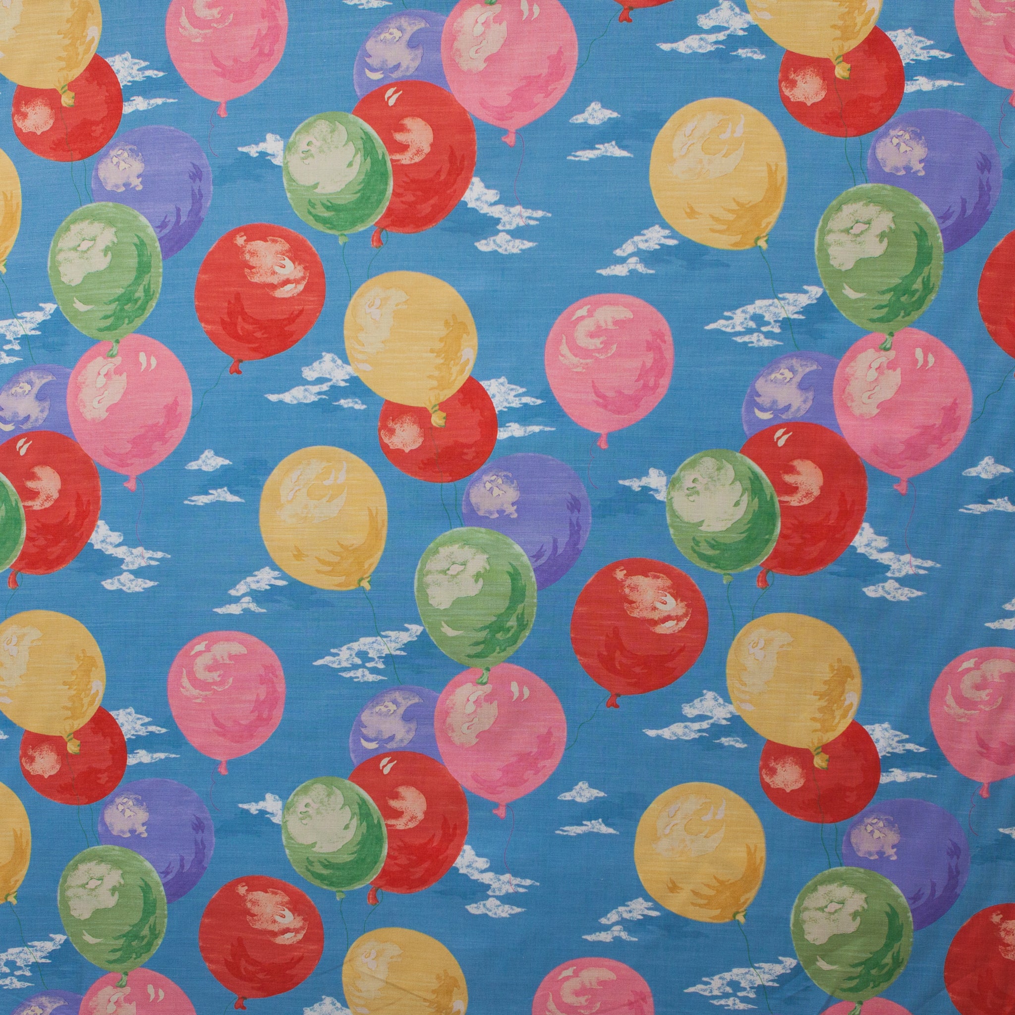 Pattern of colorful balloons on a blue background