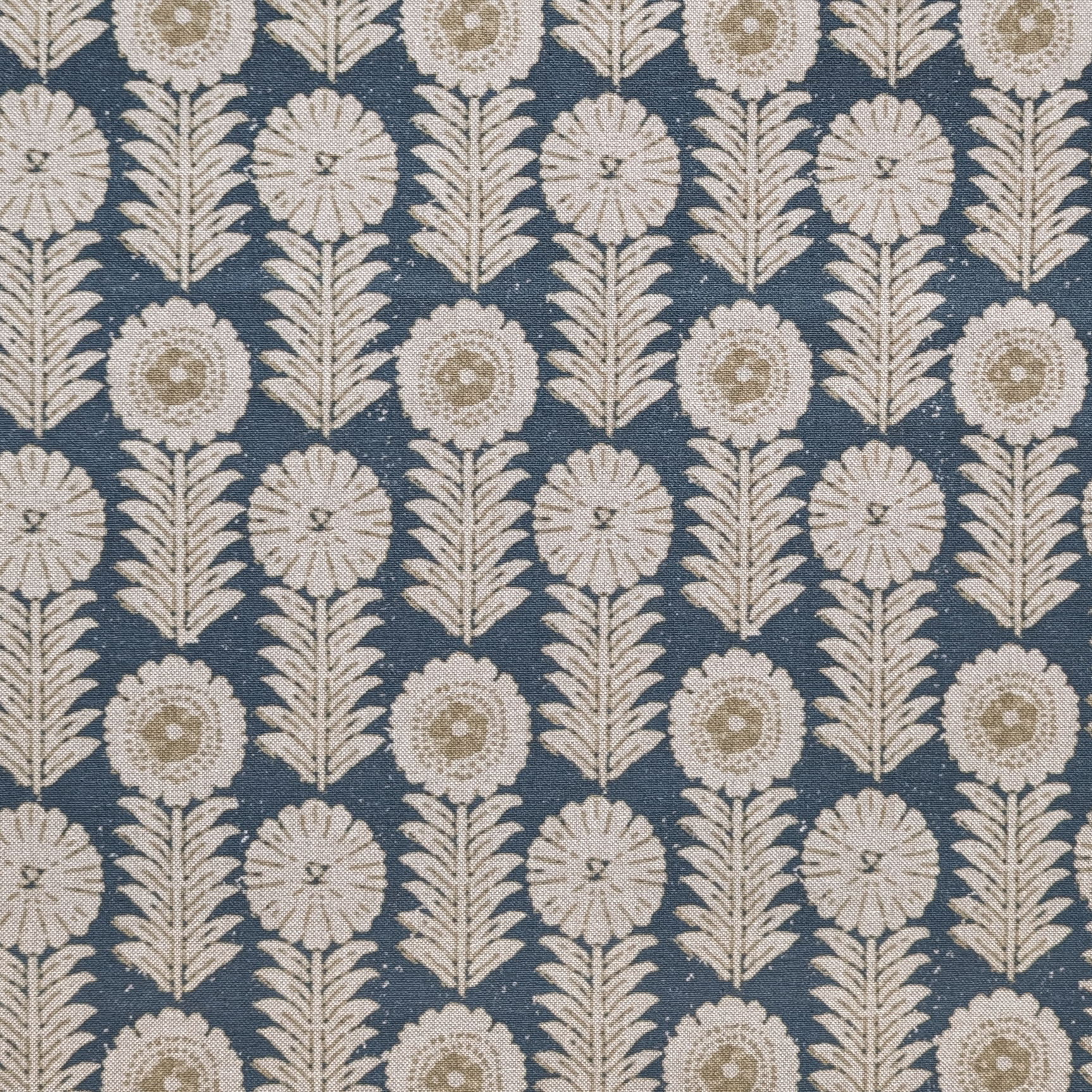 Patterned fabric with floral design on a blue background