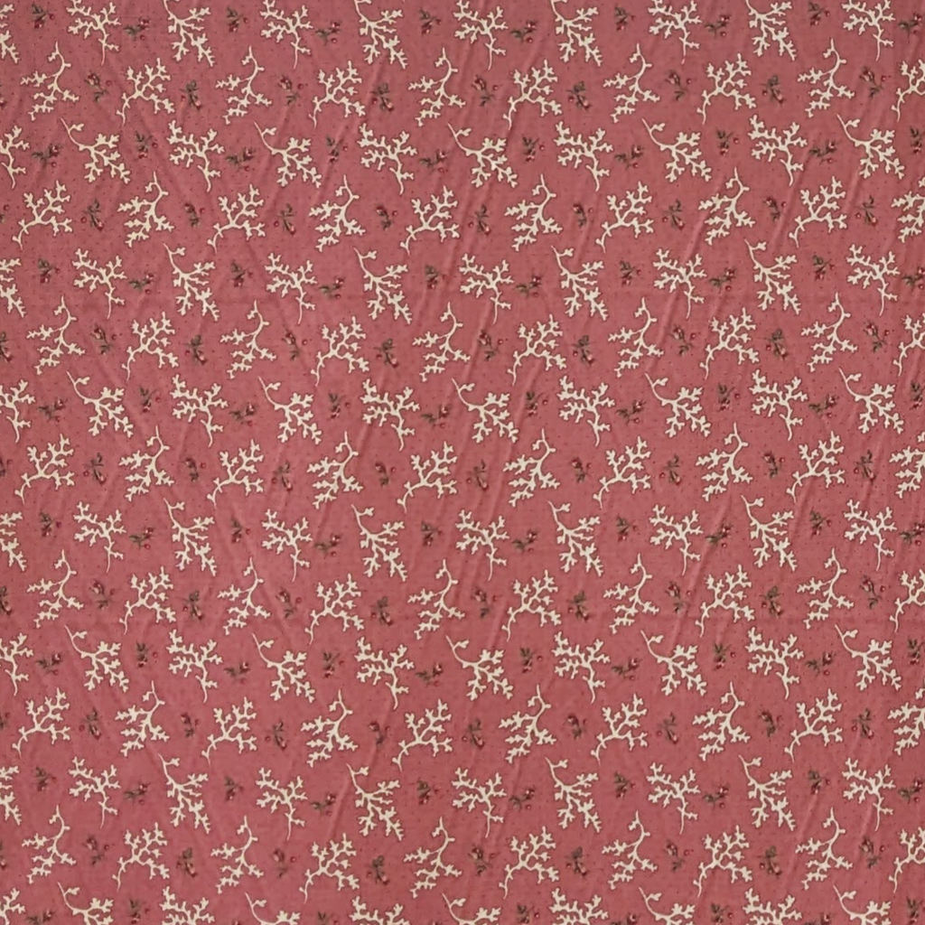Small floral and coral pattern on a red background