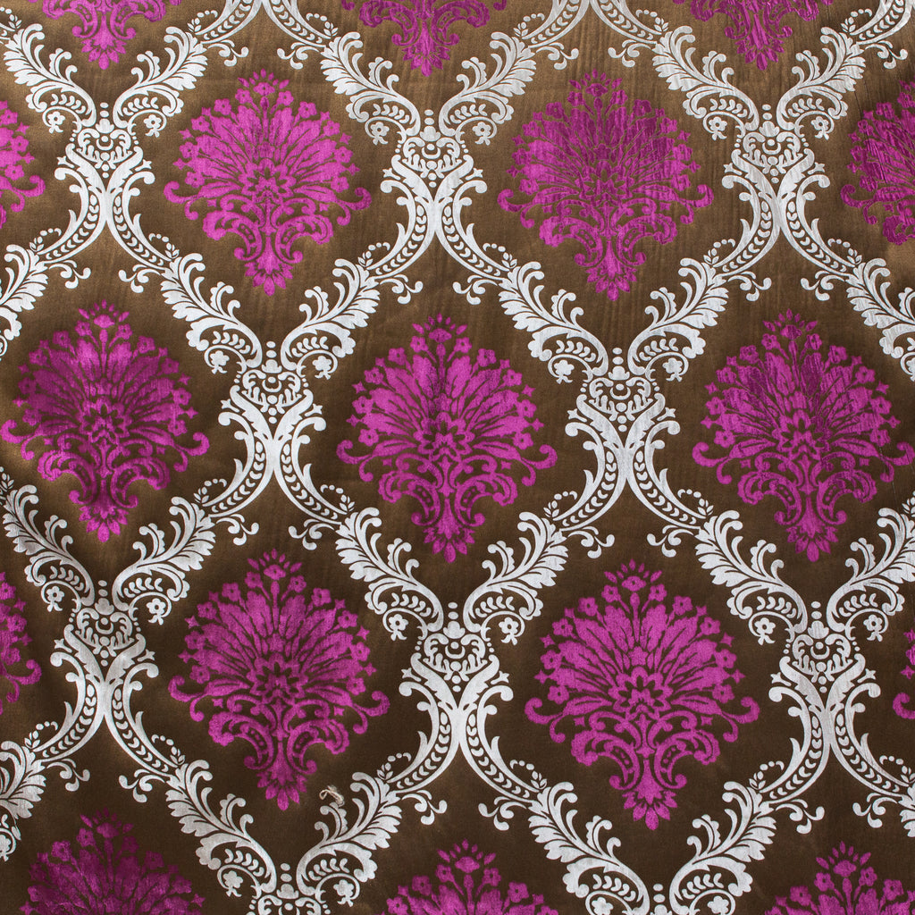 Decorative pattern with pink and white elements on a brown background
