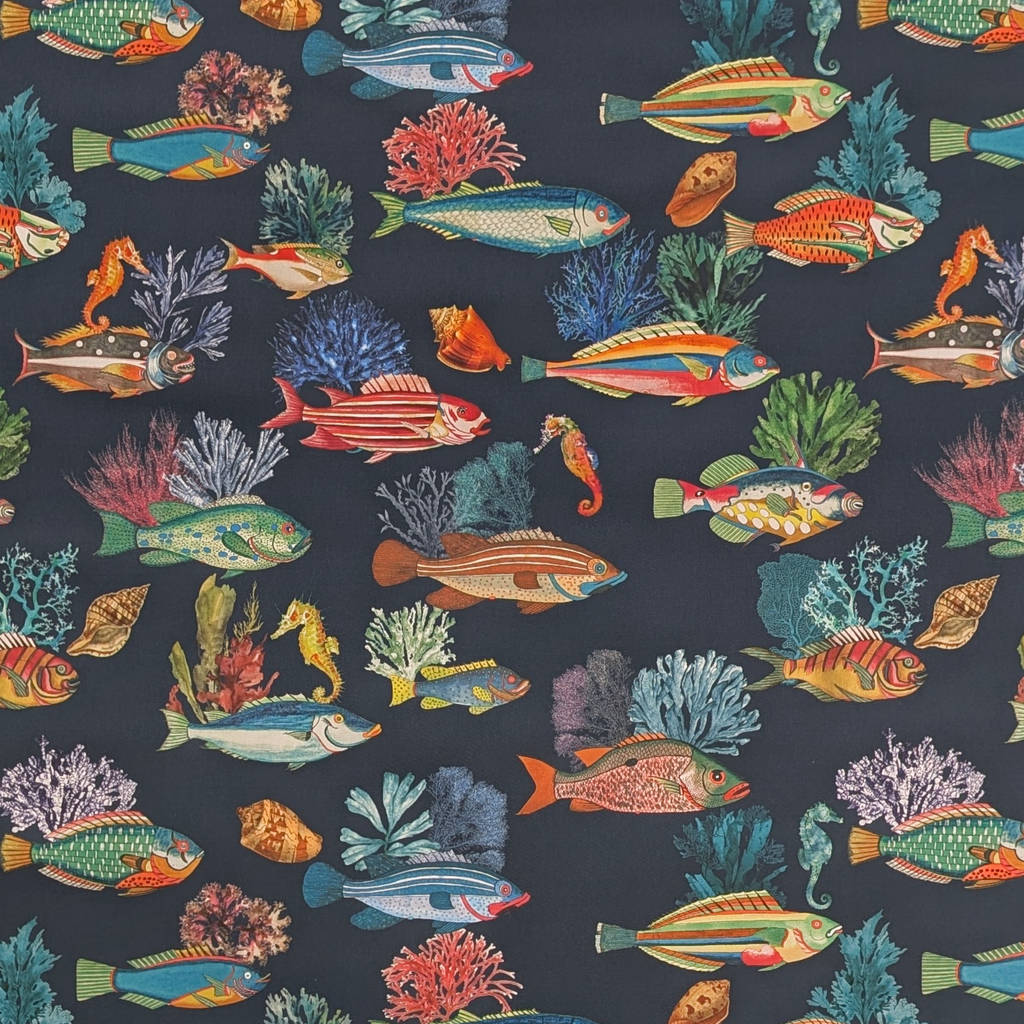 Pattern of colorful fish and sea creatures on a dark blue background