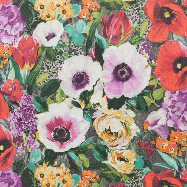 Vibrant floral pattern fabric with purple, yellow red and green 