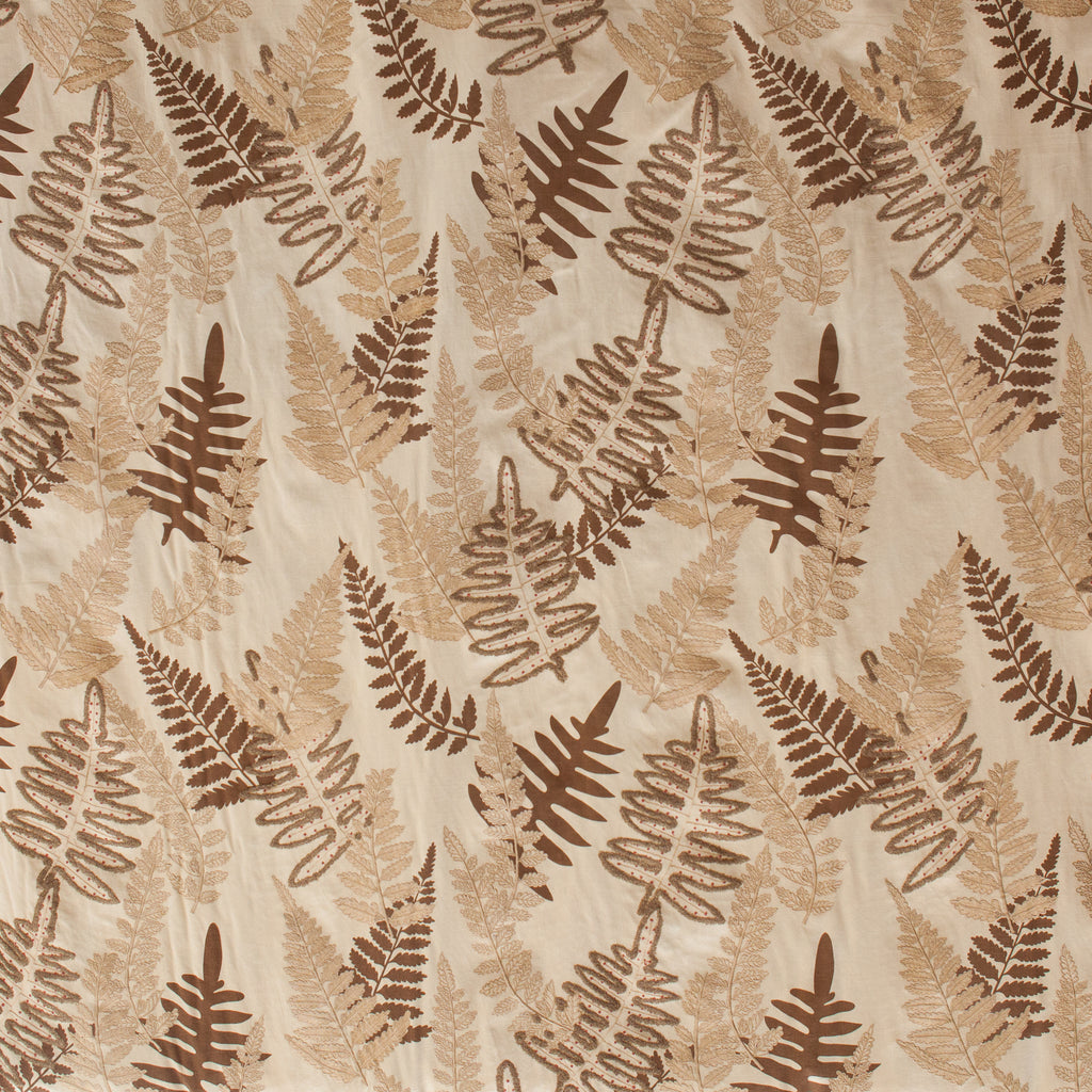 Pattern of brown fern leaves on a beige background