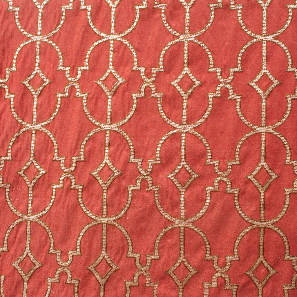 Red fabric with gold geometric pattern
