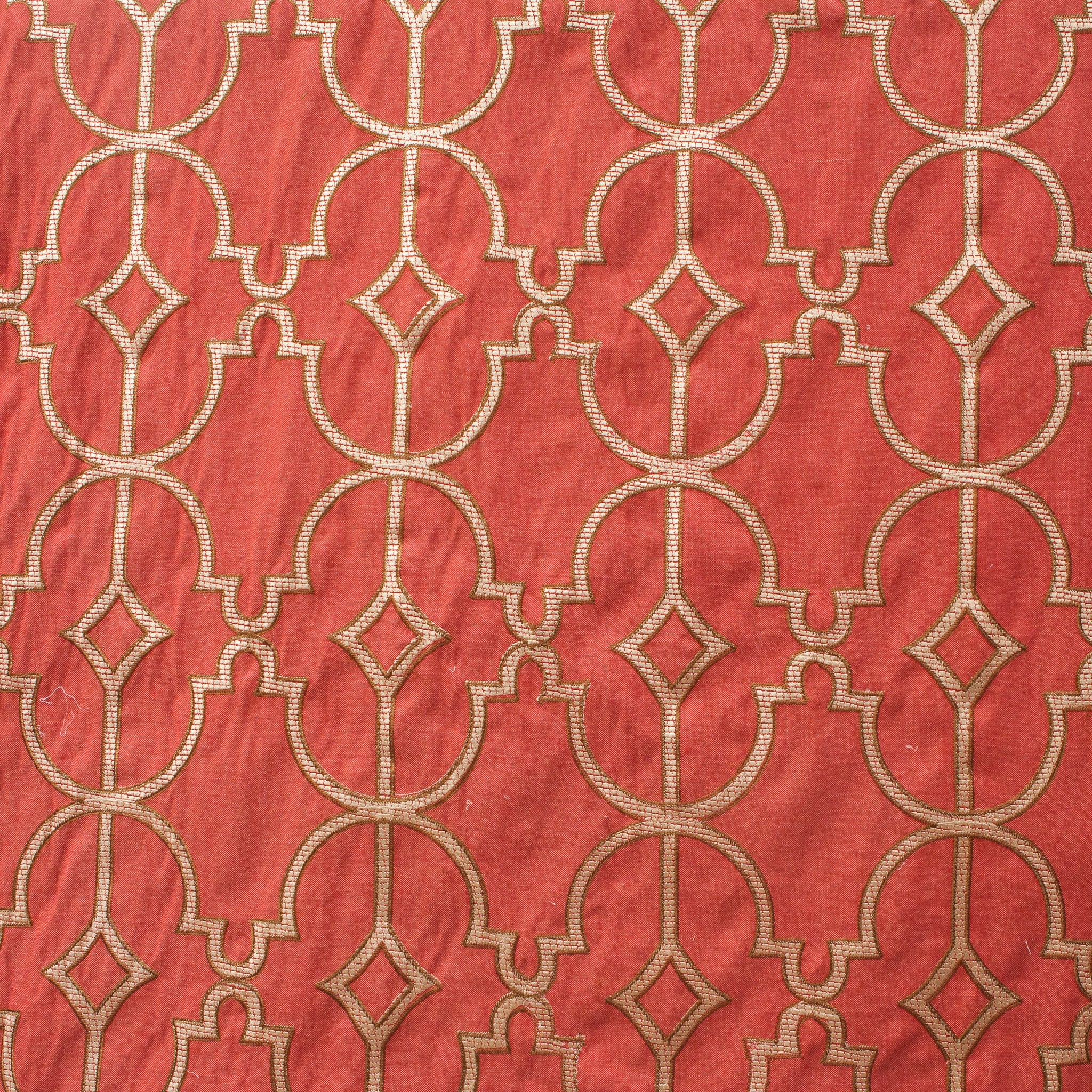 Red fabric with gold geometric pattern