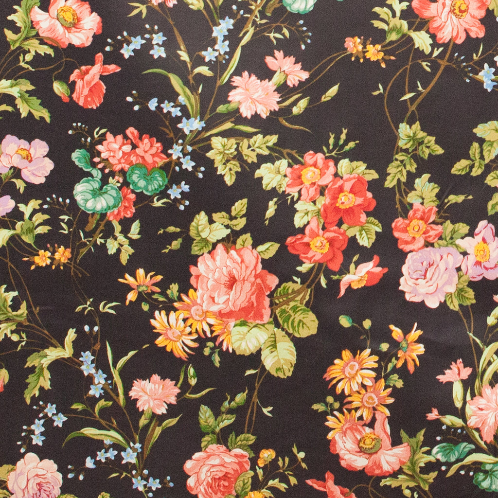 Floral pattern with pink, red, and green flowers on a black background