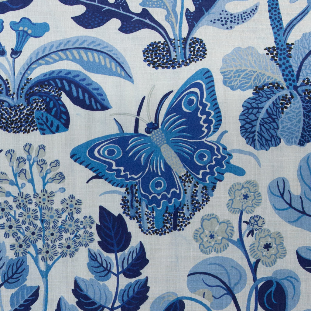 Blue butterfly and floral pattern on a white background
