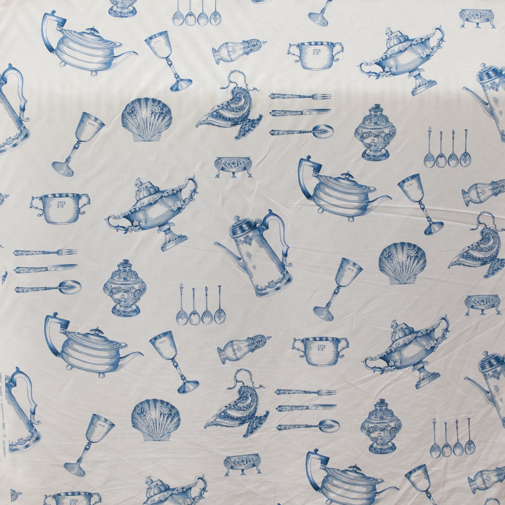 Pattern of blue kitchenware items on a white background