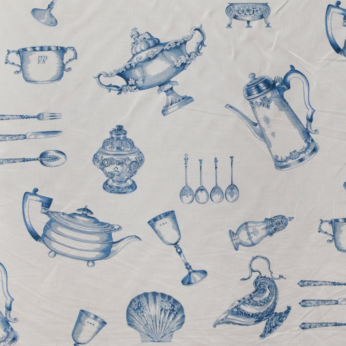 Pattern of blue kitchenware items on a white background