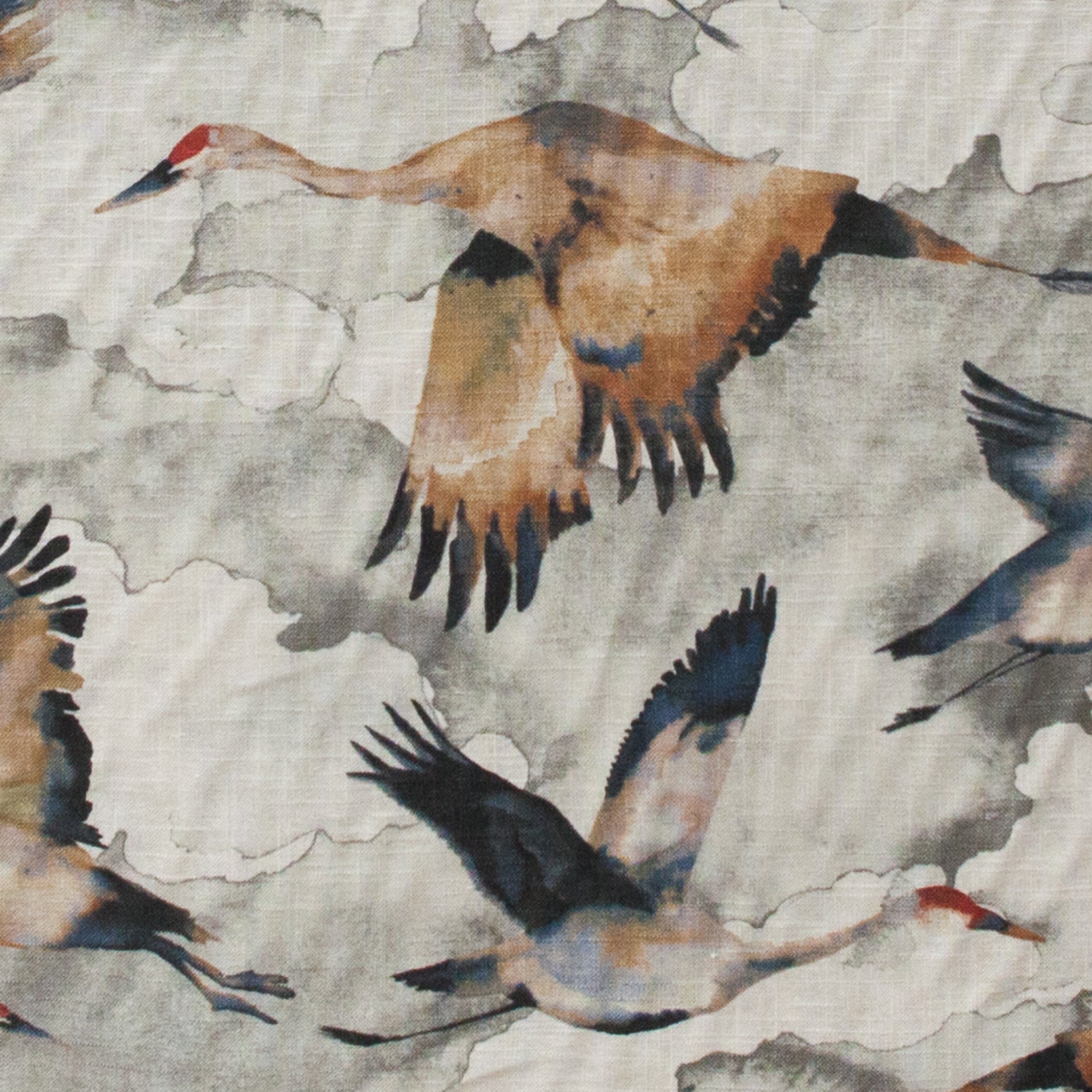 Pattern of cranes in flight on a textured fabric background