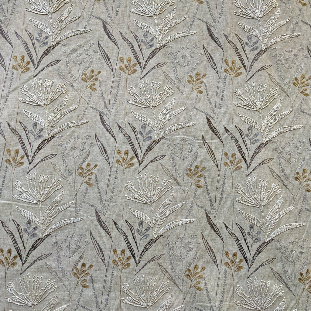 Embroidered flowers and grasses in natural linen and brown tones 