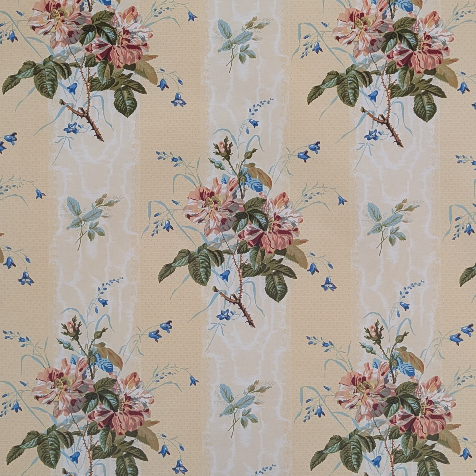 Floral patterned wallpaper with pink flowers and green leaves on a beige background