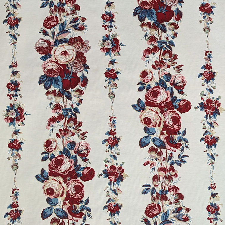 Floral pattern with red, blue, and white flowers on a beige background