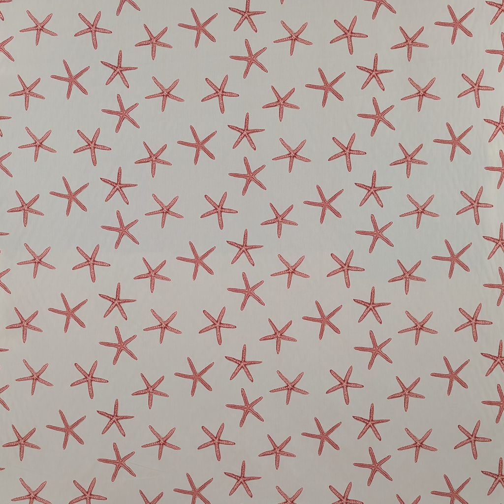 Pattern of red starfish shapes on a beige background