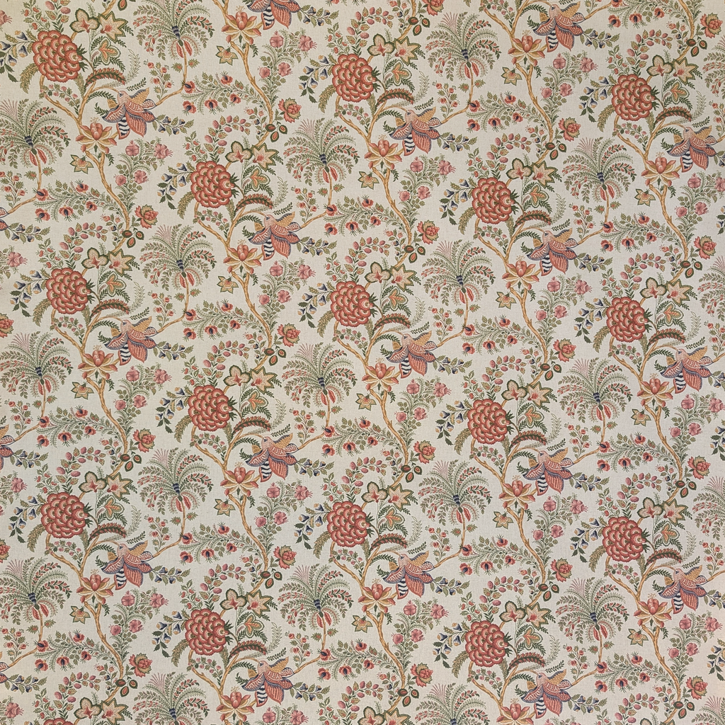 Green and pink tree vine and floral pattern on fabric