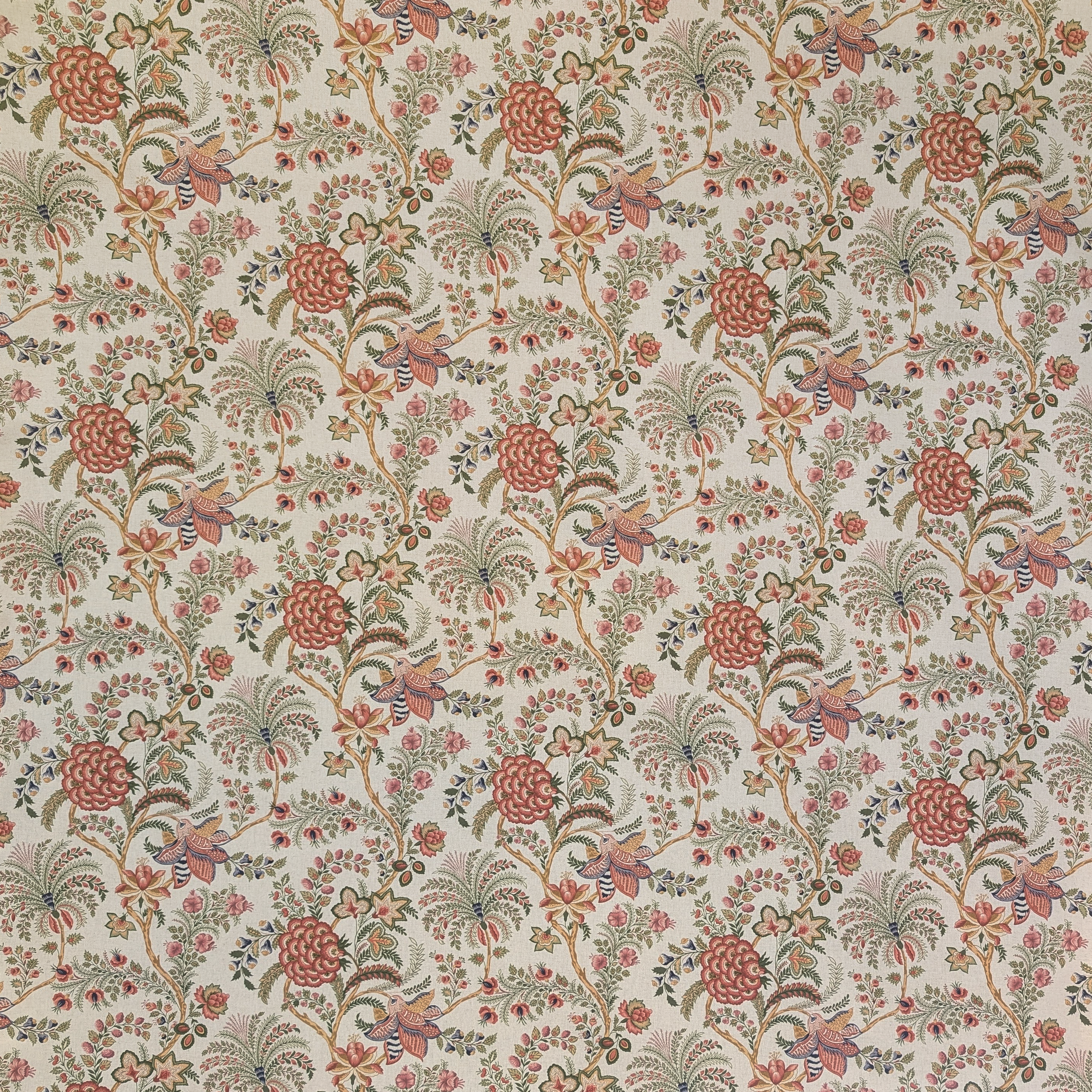 Green and pink tree vine and floral pattern on fabric