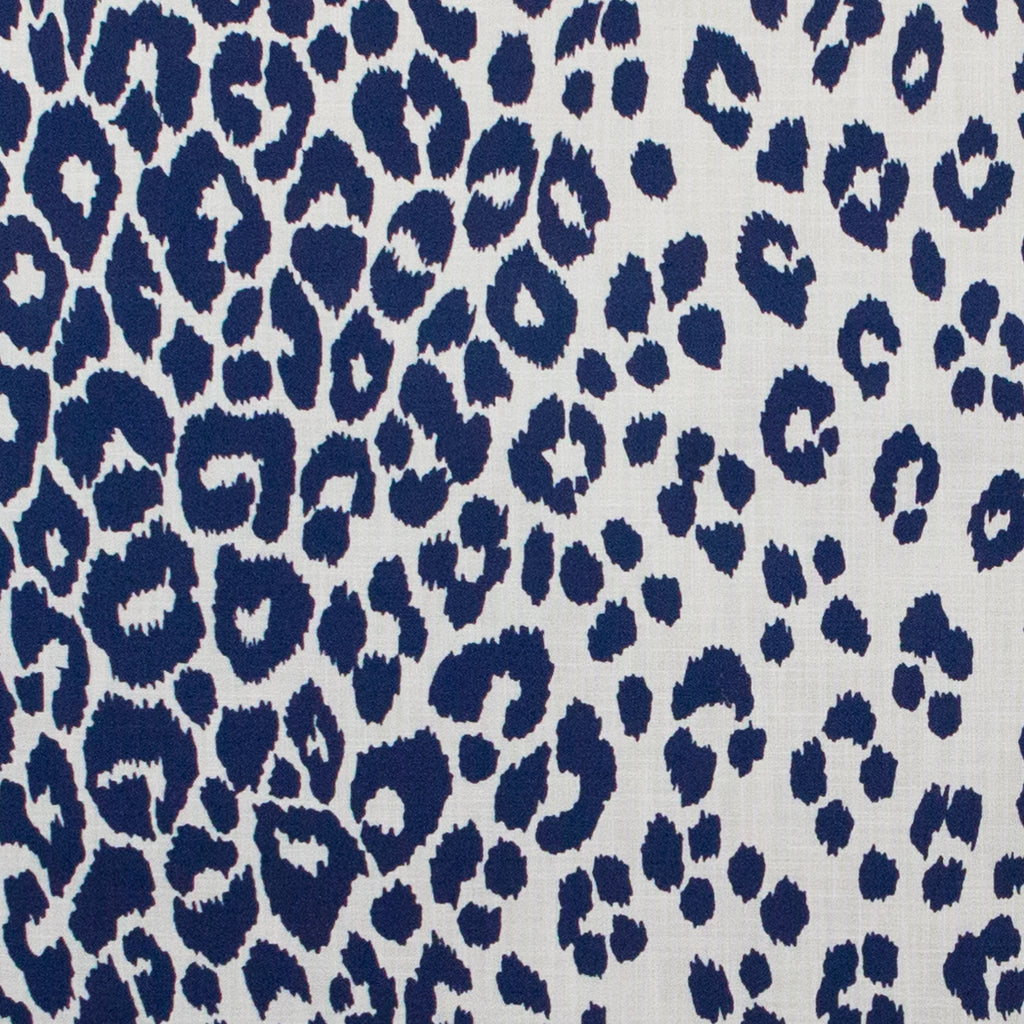 Navy blue leopard print pattern on a light gray background