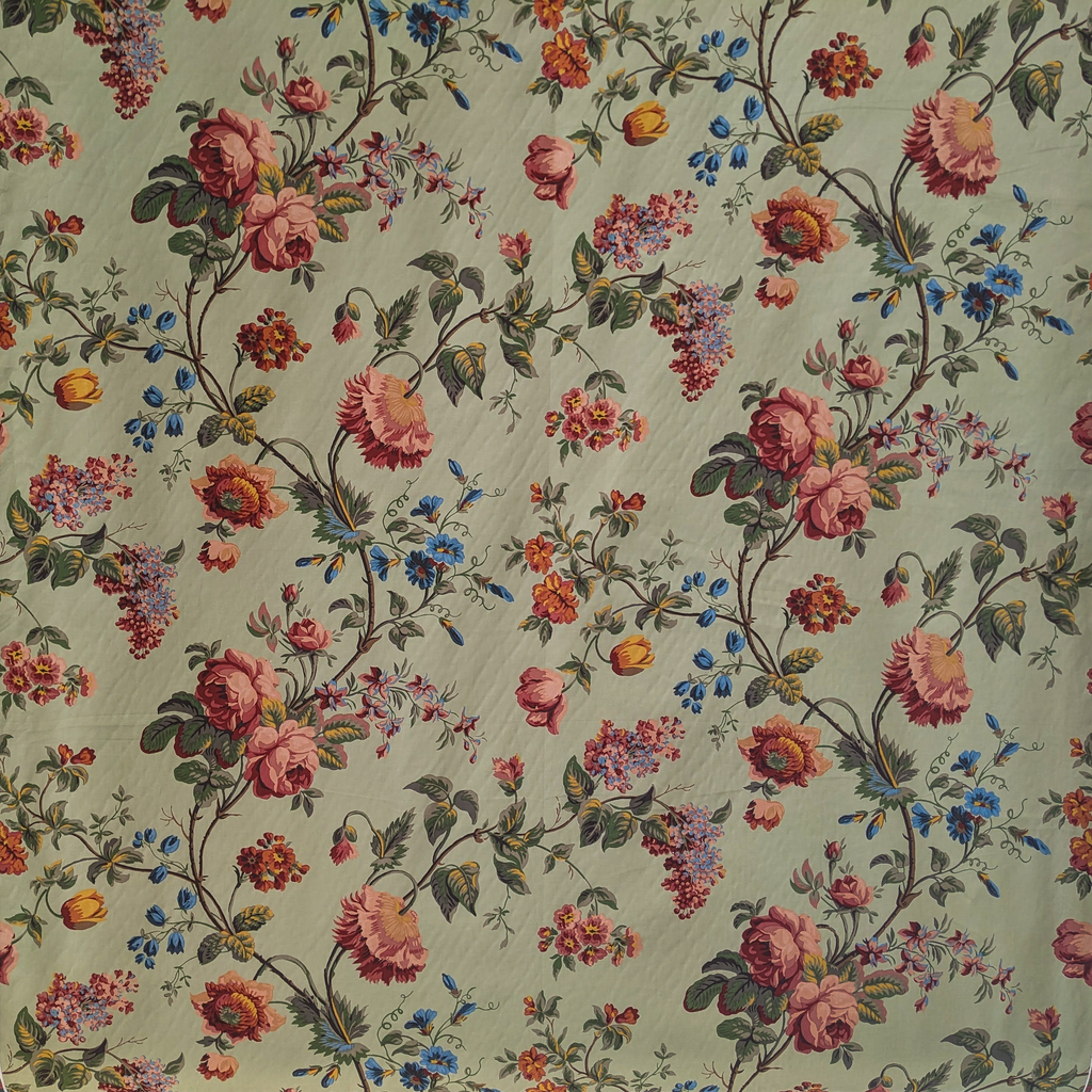 Traditional floral vine fabric design with duck egg background 