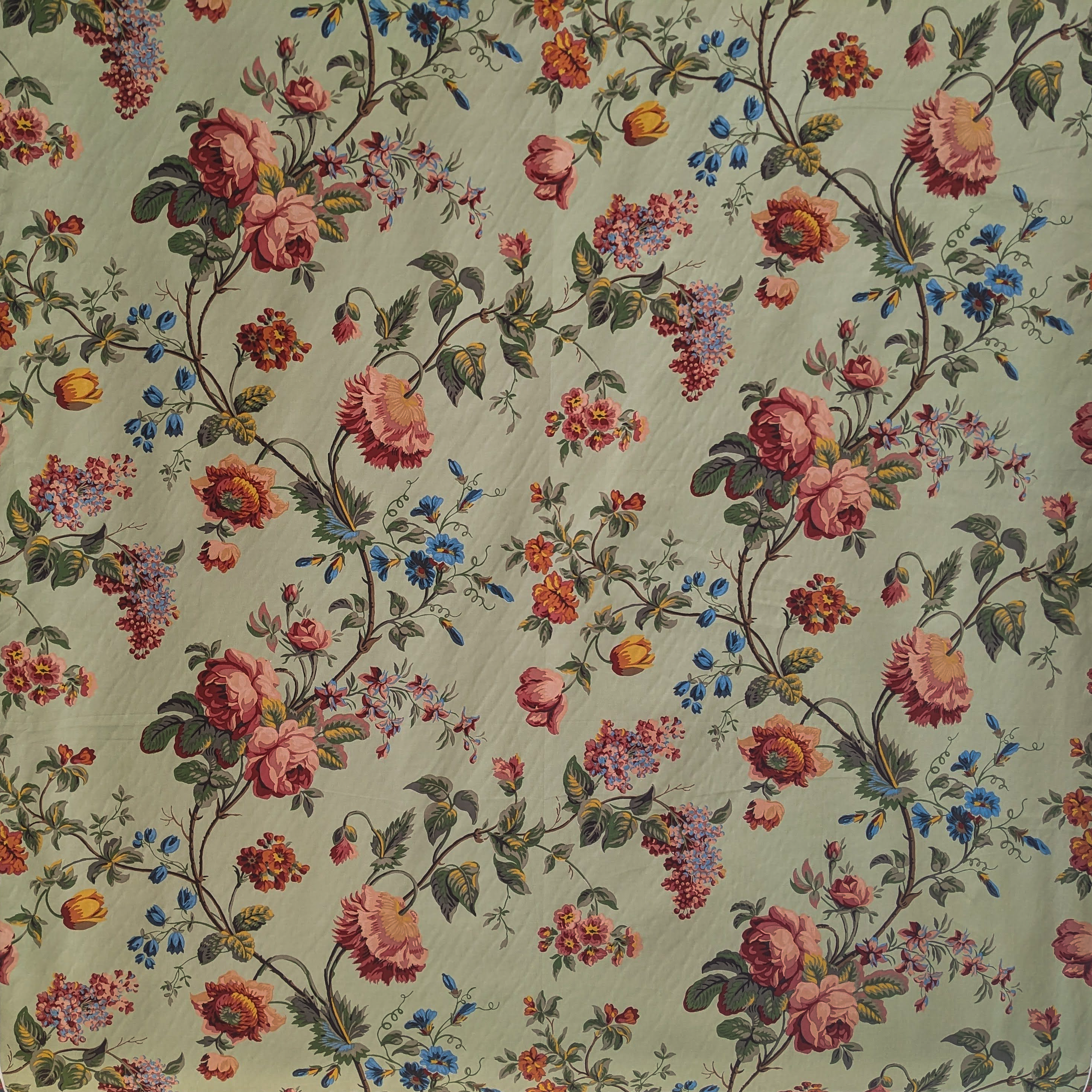 Traditional floral vine fabric design with duck egg background 