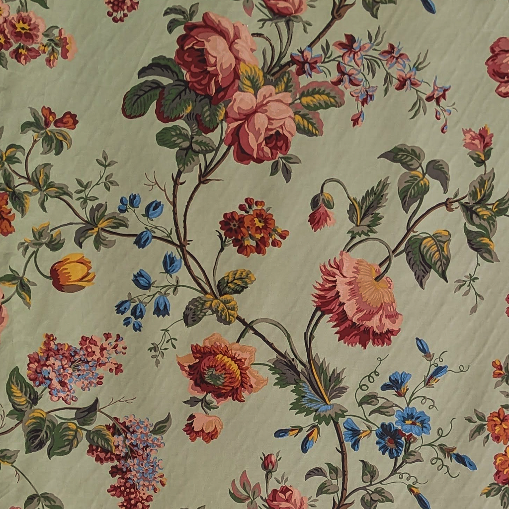Traditional floral vine fabric design with duck egg background 