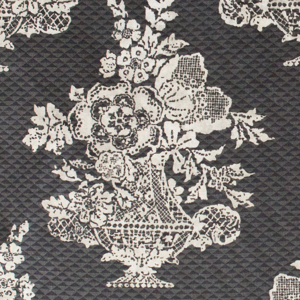 Lace pattern with floral design on a textured background