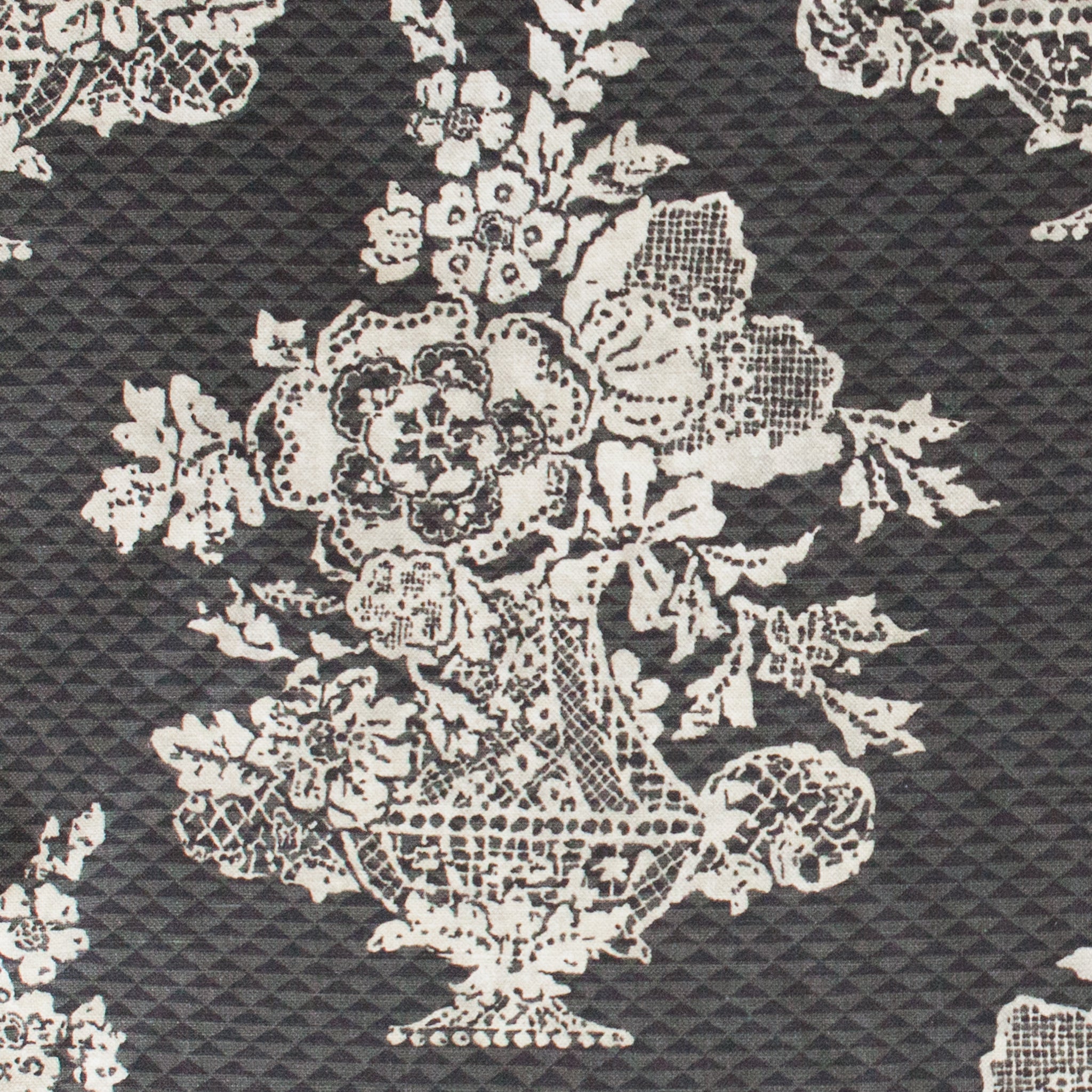 Lace pattern with floral design on a textured background