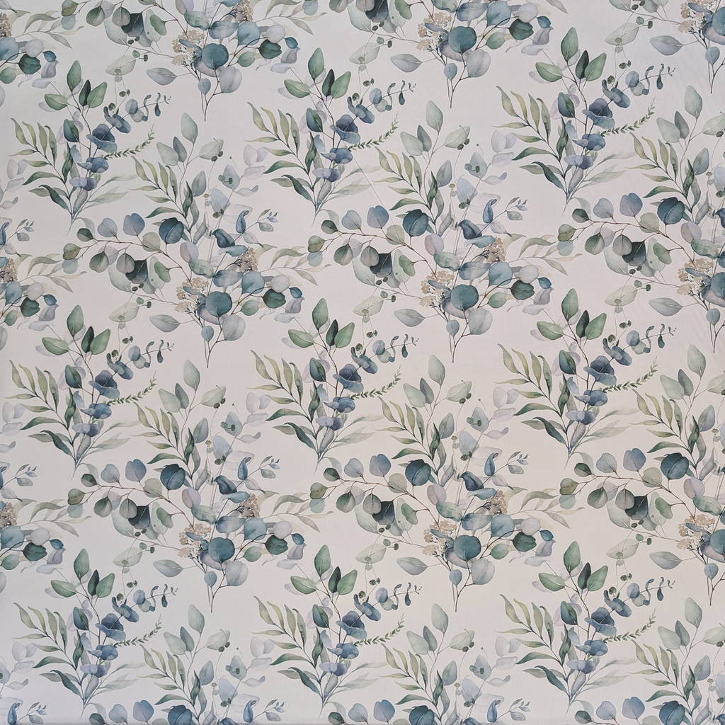 Pattern of green and blue leaves on a light background