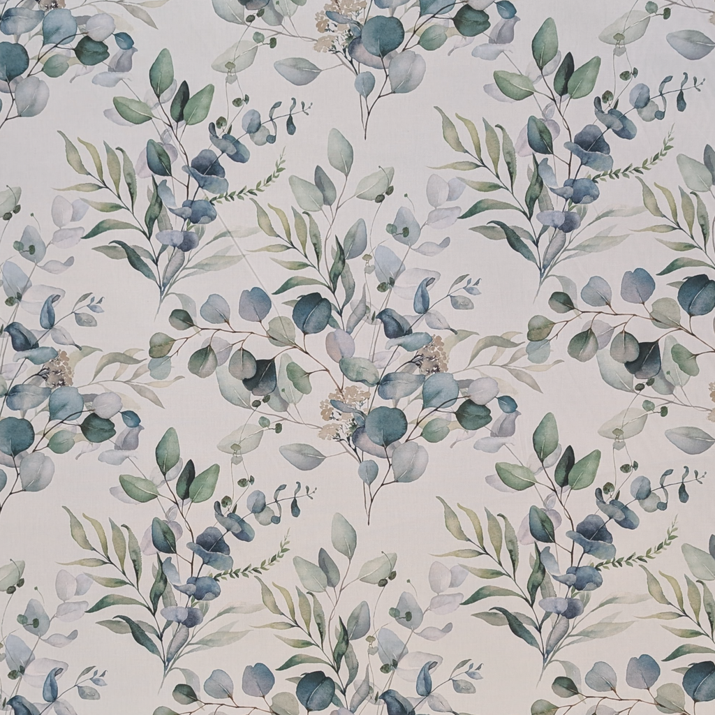 Pattern of green and blue leaves on a light background