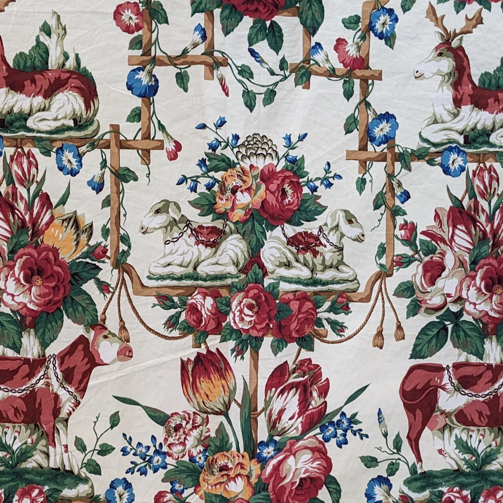 Decorative fabric with floral and animal pattern on a white background