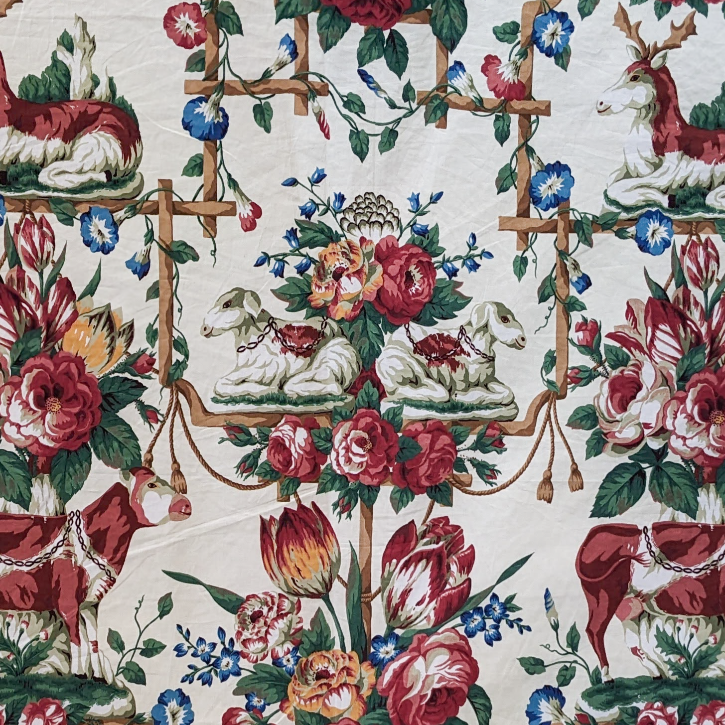 Decorative fabric with floral and animal pattern on a white background