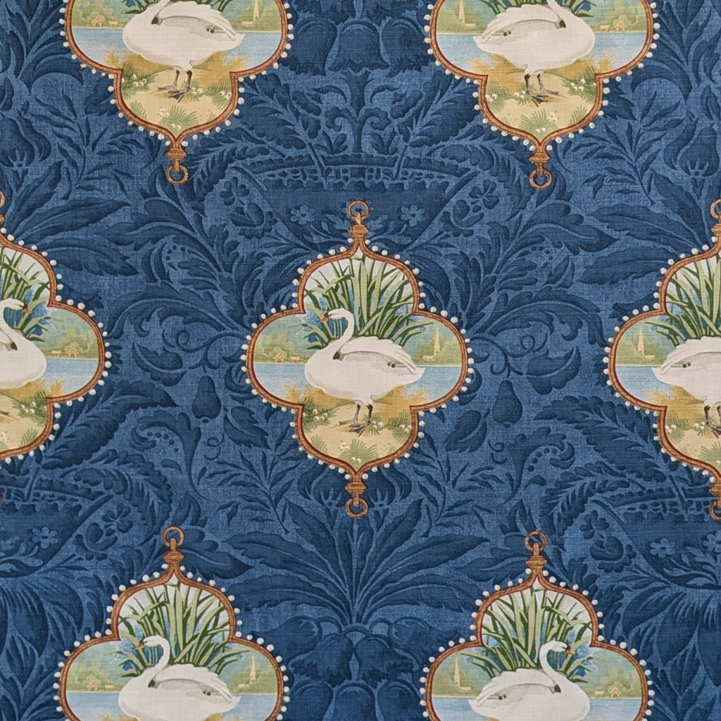 Patterned fabric with swan design on a blue background