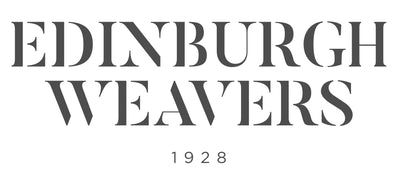 Logo of Edinburgh Weavers with text 'Edinburgh Weavers 1928' on a white background