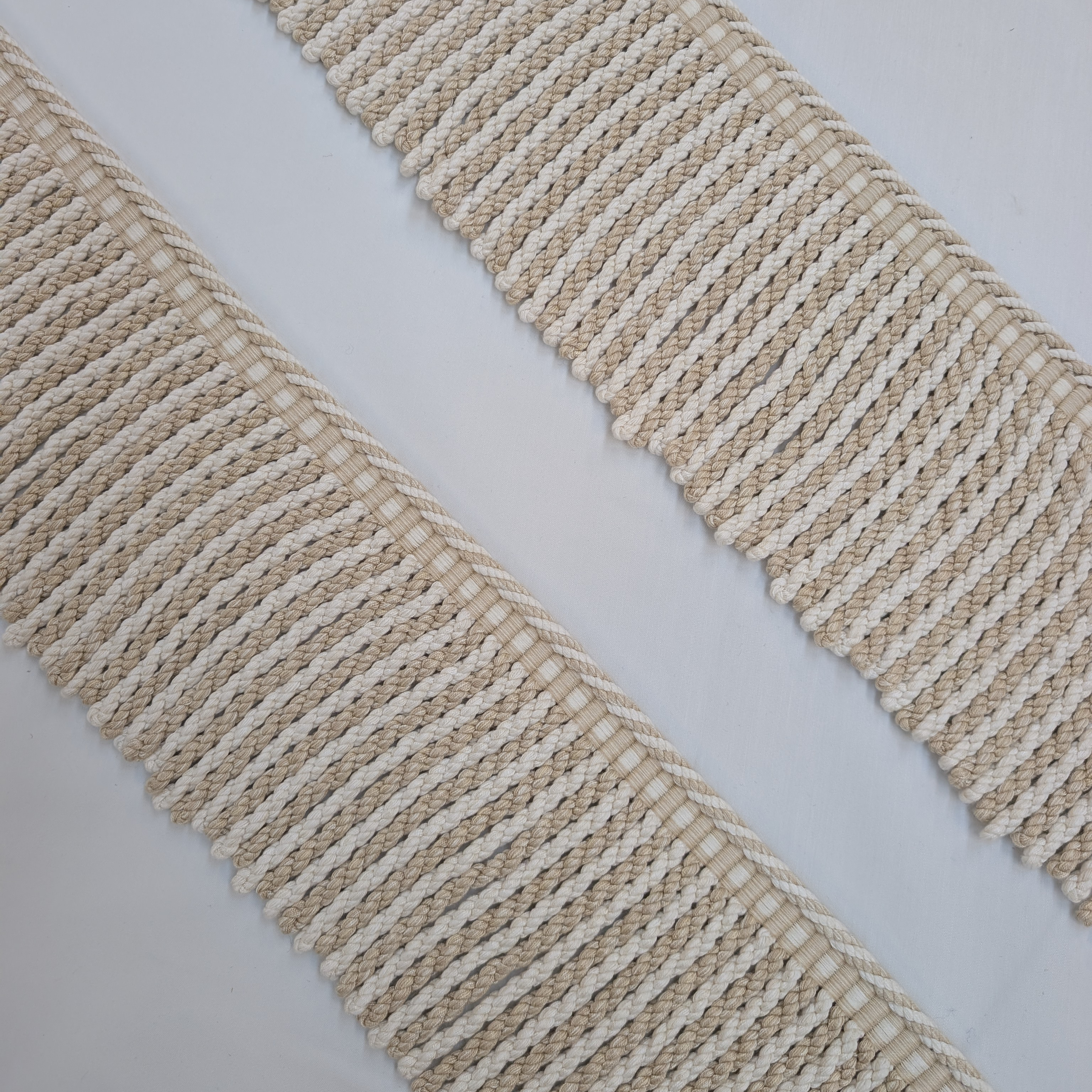 Long cream fringe trim