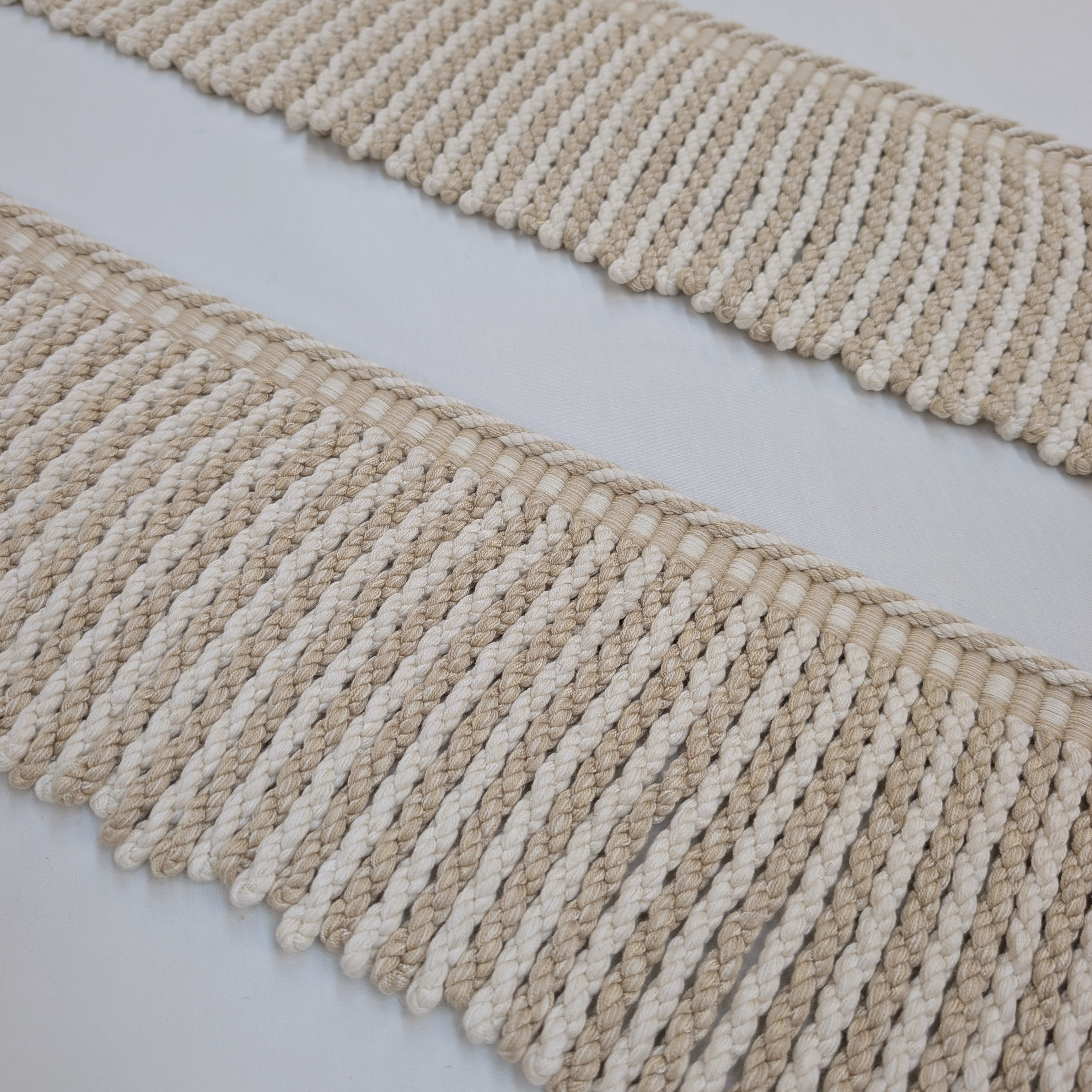 Long cream fringe trim