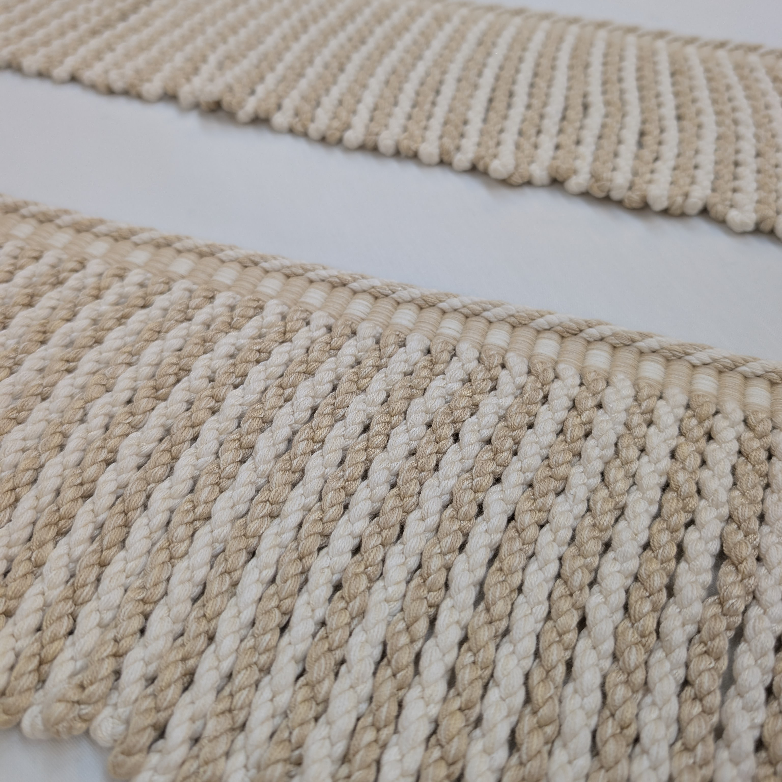 Long cream fringe trim