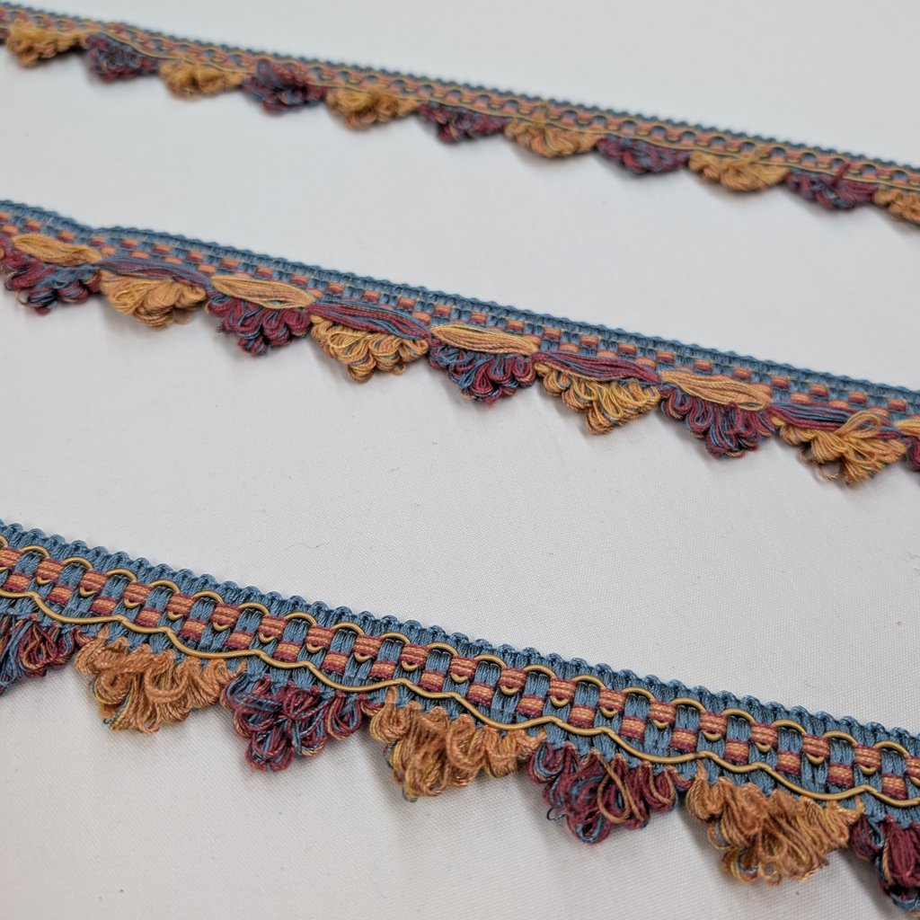 Decorative lace trim in multicolor on a white background