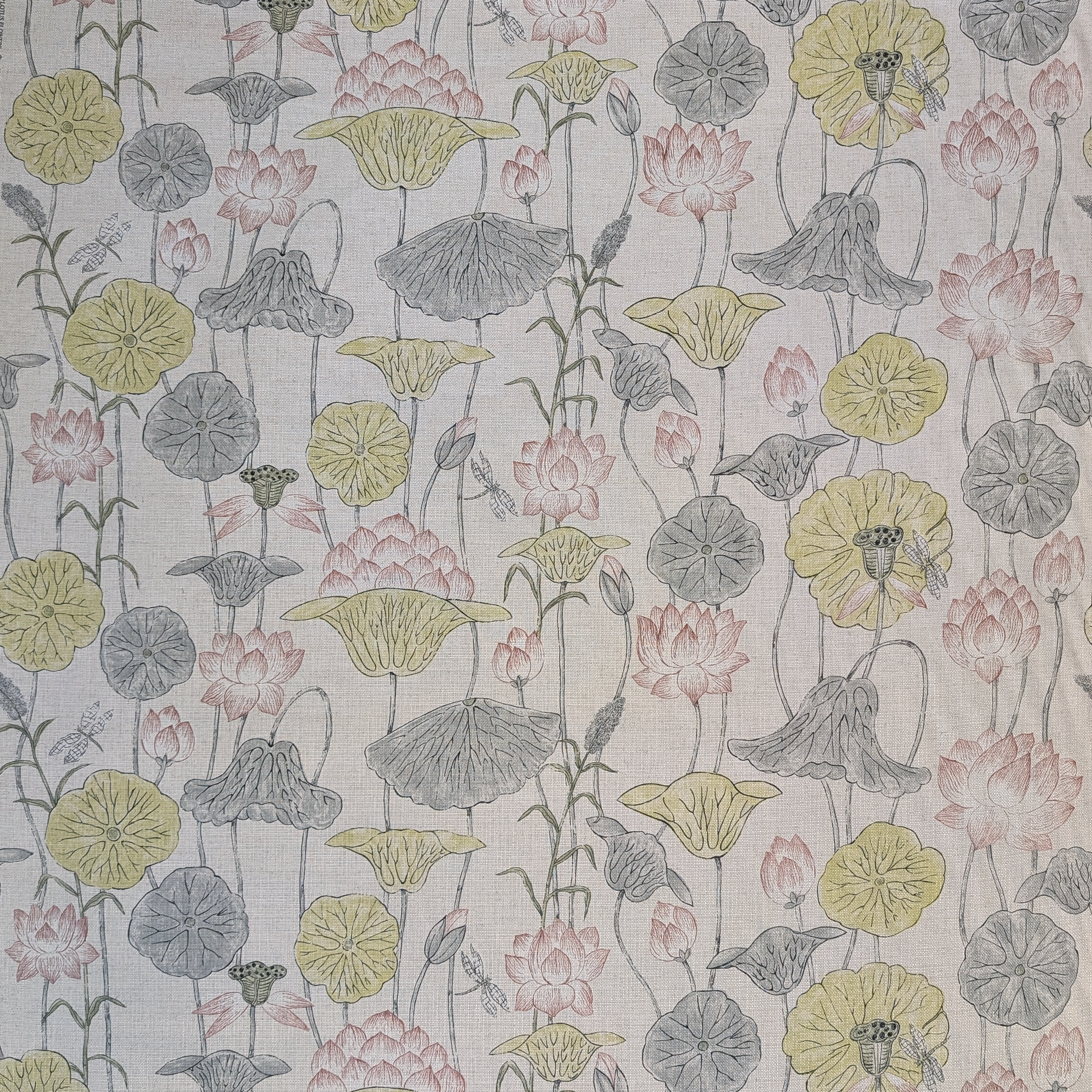 Patterned fabric with floral design on a light gray background