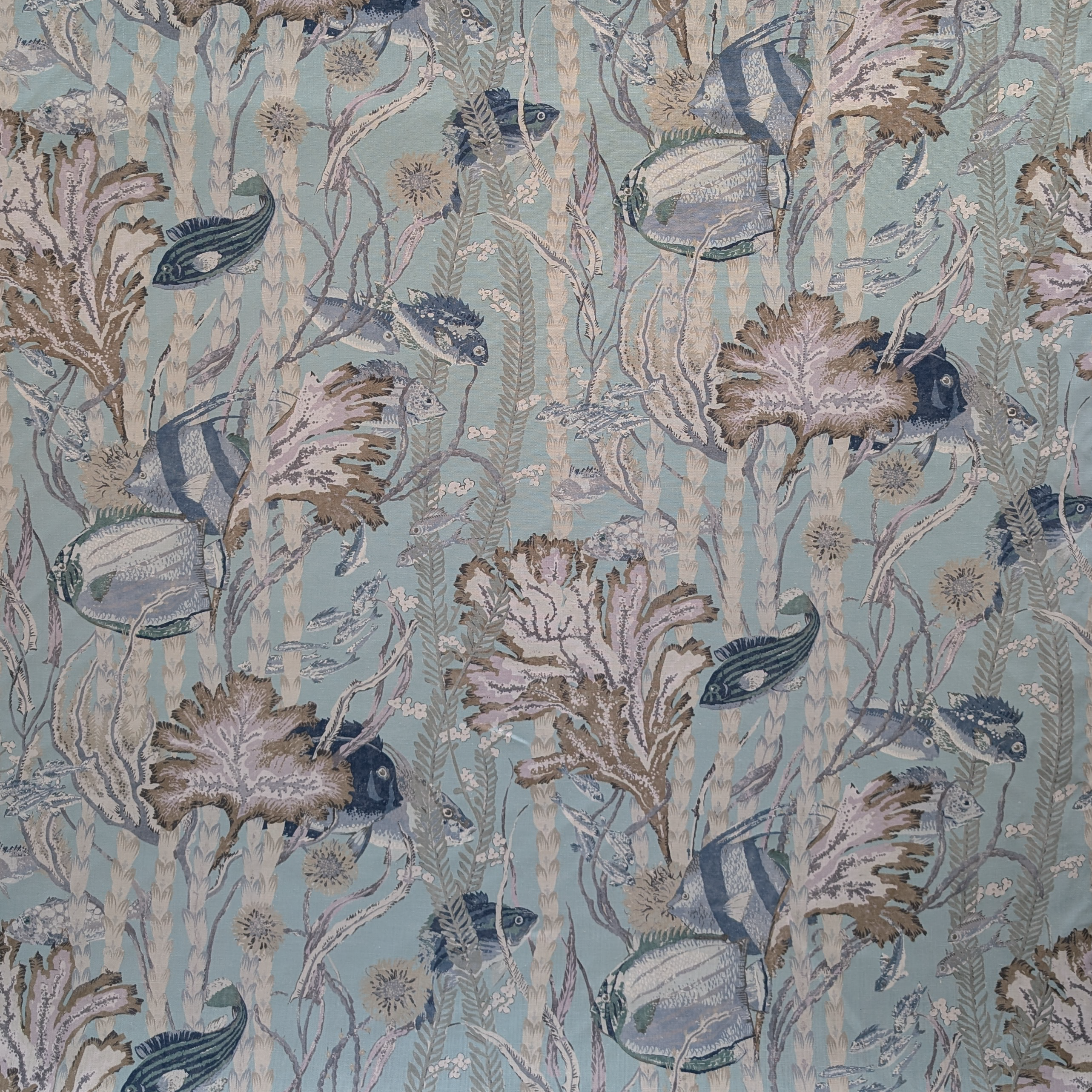 Seamless pattern of underwater scene with fish and seaweed on a light blue background