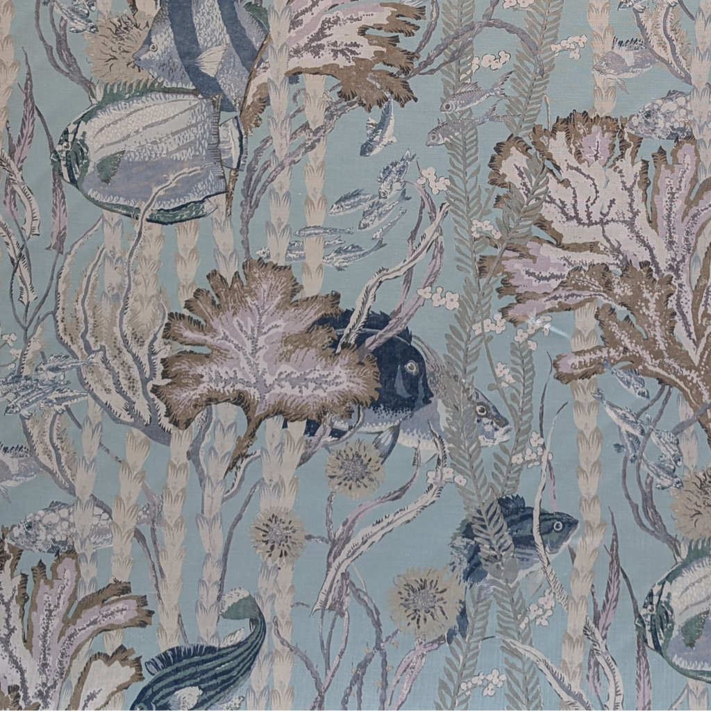 Blue and beige fish and seaweed fabric 