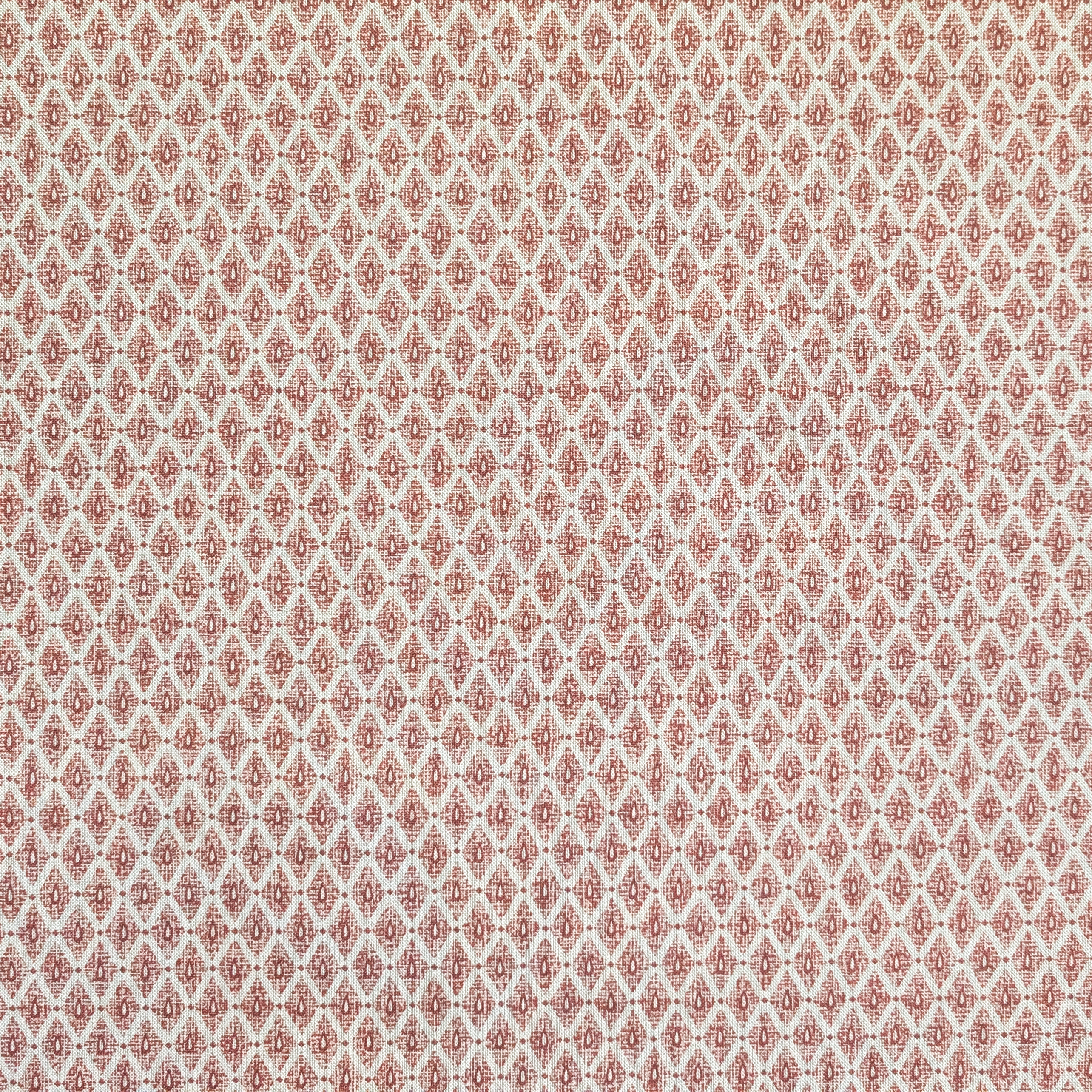 Patterned fabric swatch with red and beige design