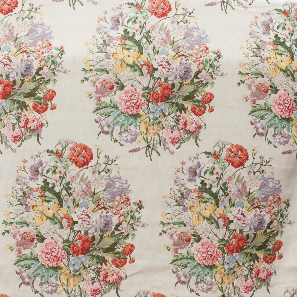 Floral patterned fabric with colorful flowers on a light background