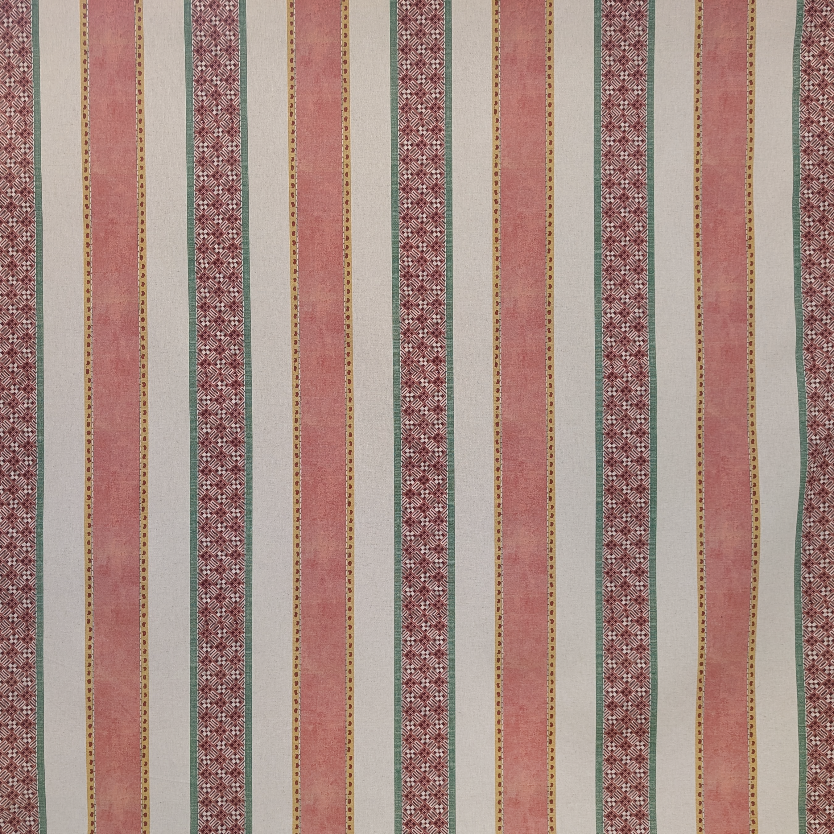 Striped fabric pattern with pink, green, and red stripes on a white background