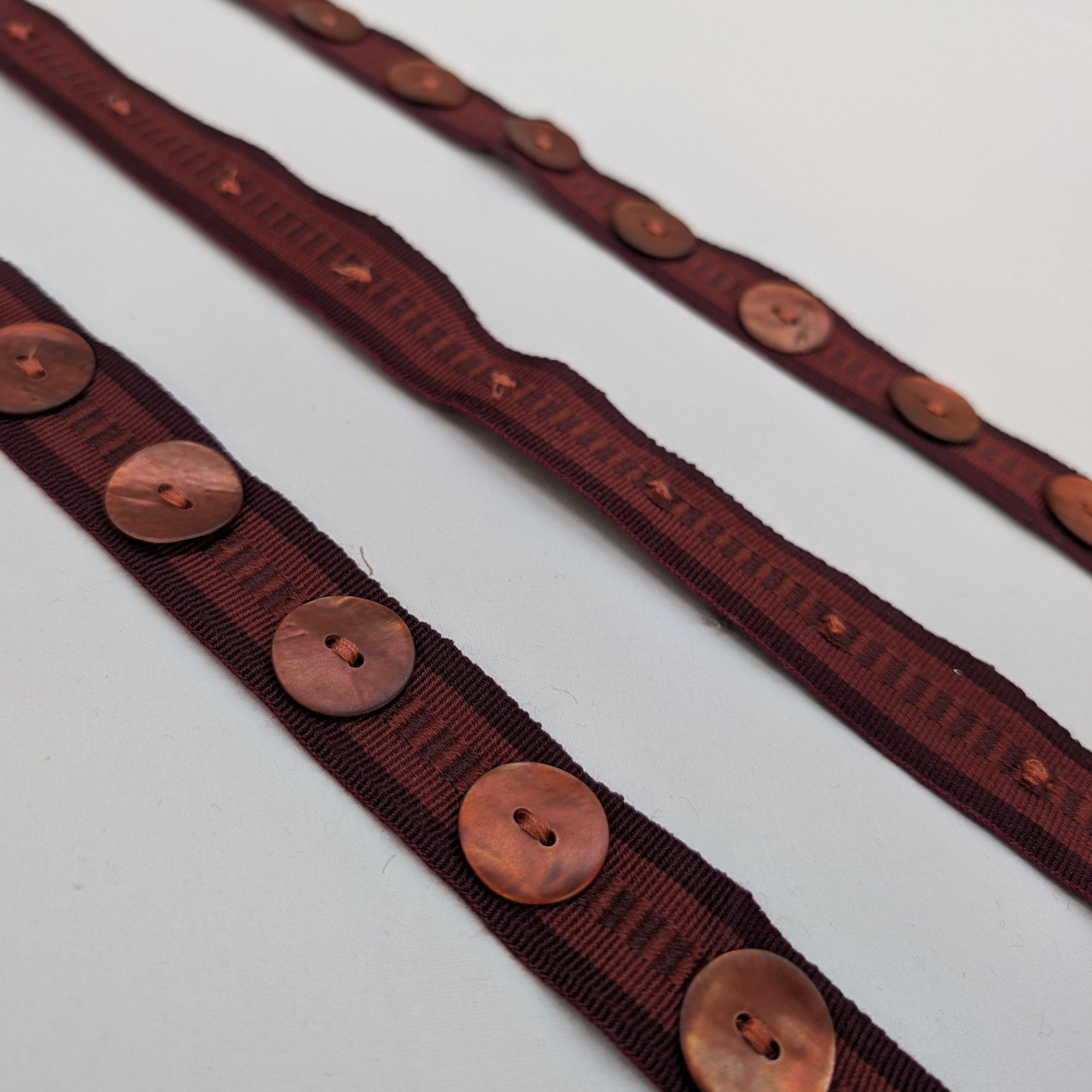 Burgundy button trim 