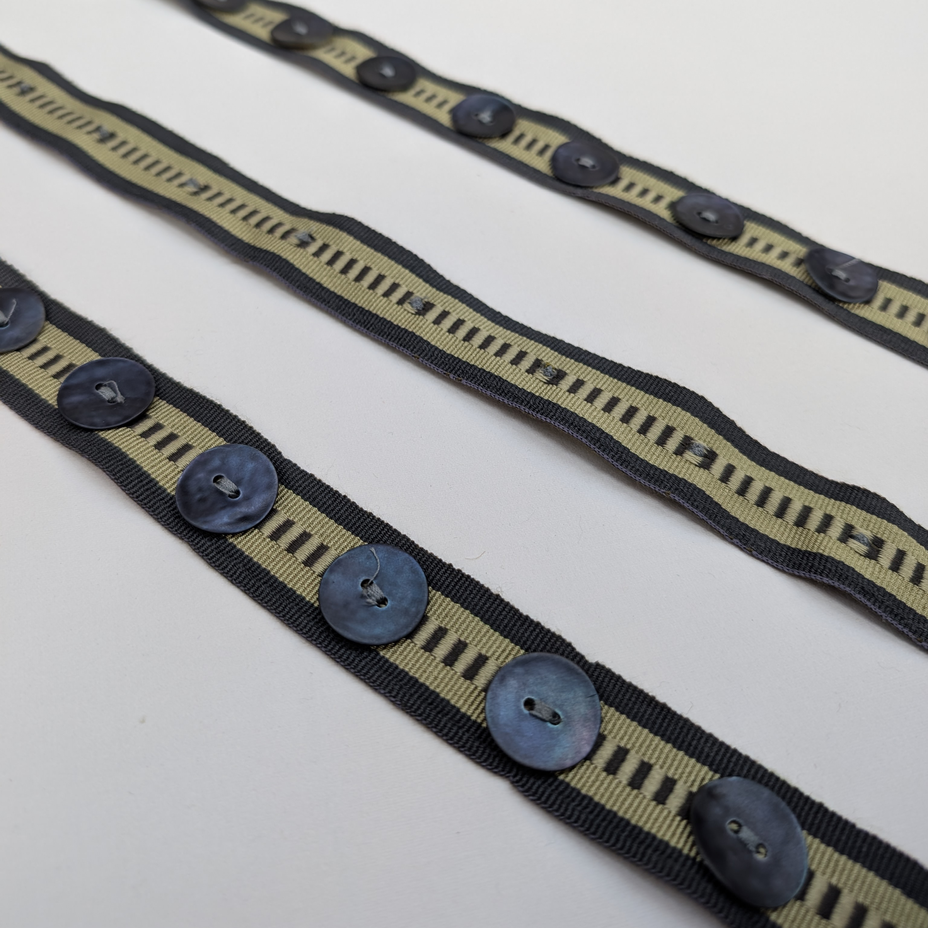 Button trims in green and blue 