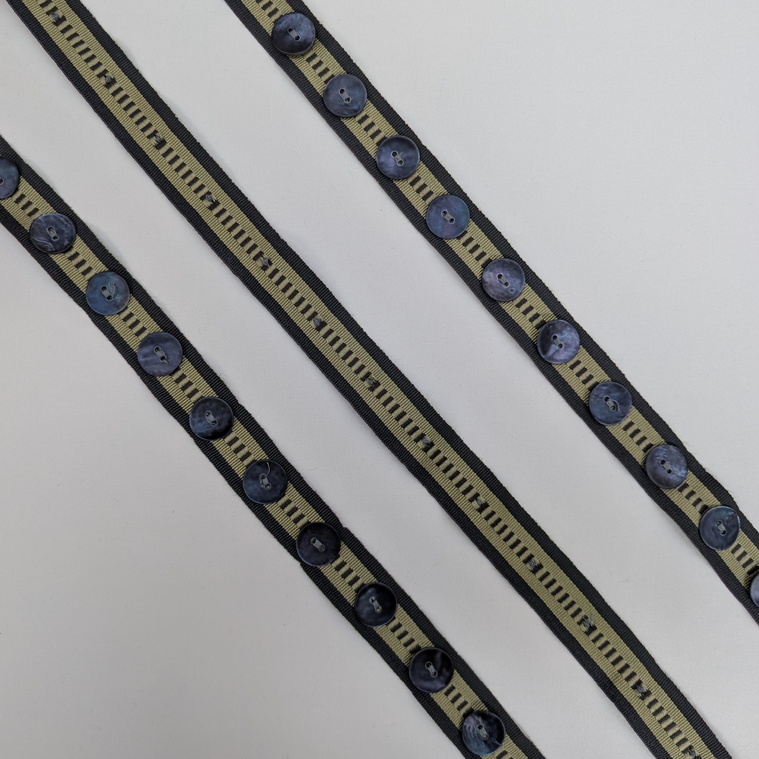 Button trim in green and blue 