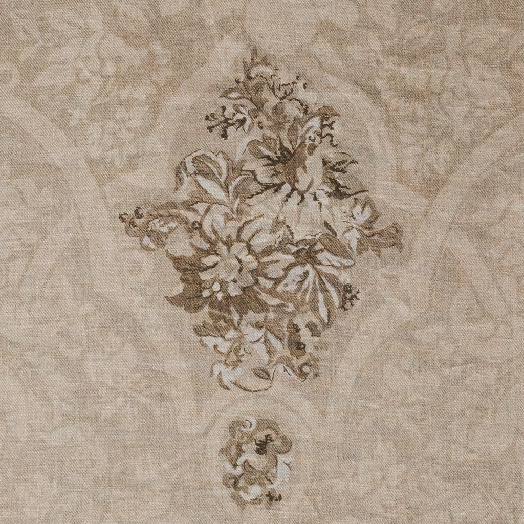 Decorative floral pattern on a textured beige background