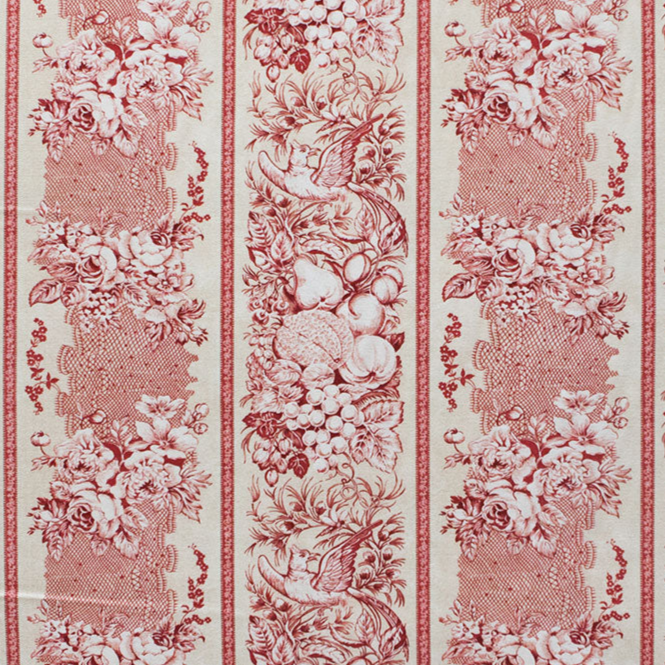 Floral patterned fabric with red and white design on a beige background