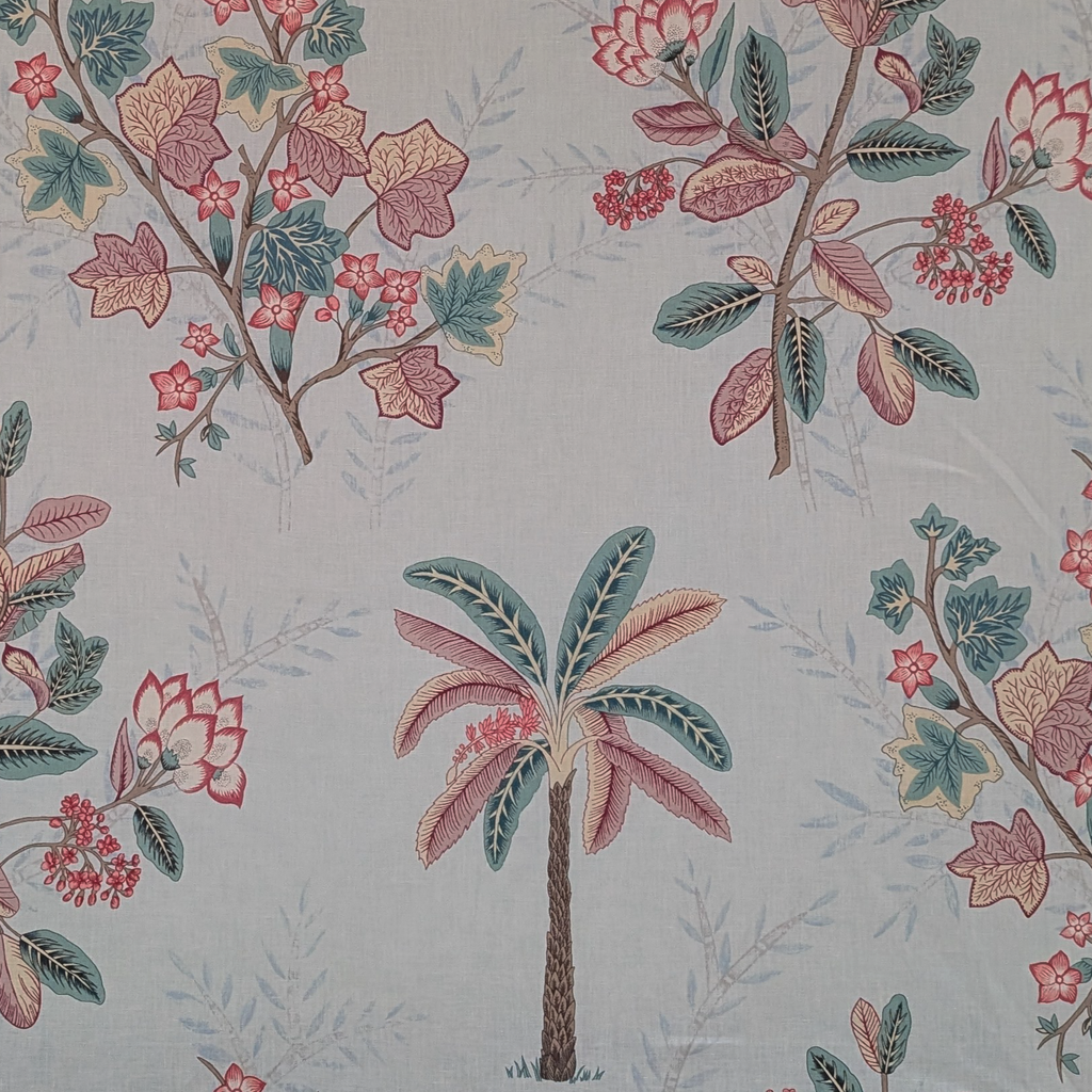 Pattern of palm trees and floral branches on a light background